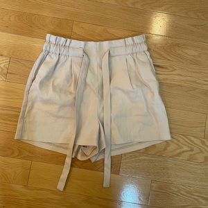 Express light pink paper bag shorts